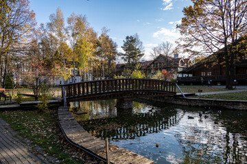 Fototapeta premium ancient architecture with elements of wooden architecture against the background of the autumn sky