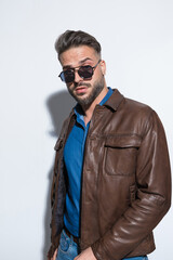 Fototapeta premium Sexy casual man wearing cool sunglasses