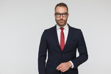 young handsome businessman wearing an elegant suit