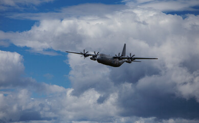 Fototapeta na wymiar Large army transport aircraft in flight at airshow in Norway