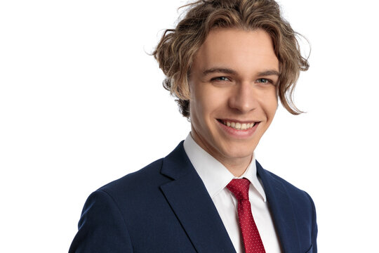 Attractive Businessman With Blue Eyes Looking Away And Smiling