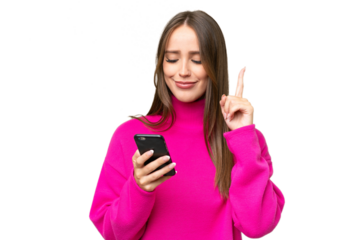Young beautiful caucasian woman over isolated background using mobile phone and lifting finger