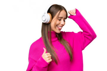Young beautiful caucasian woman over isolated background listening music and dancing