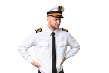 Airplane pilot man over isolated background suffering from backache for having made an effort