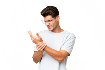 Young caucasian handsome man over isolated background suffering from pain in hands