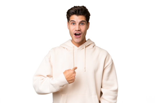 Young caucasian handsome man over isolated background with surprise facial expression