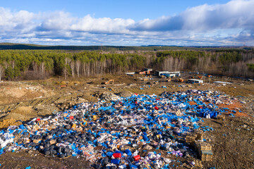Top view of a huge dump of toxic and household waste. The problem of environmental pollution