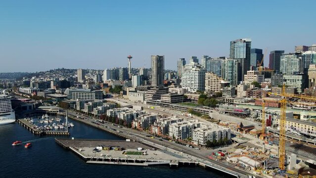 Cinematic aerial drone shot over Meydenbauer Bay Park, Clyde, Eastland, marinas in Seattle, Washington, USA at daytime.