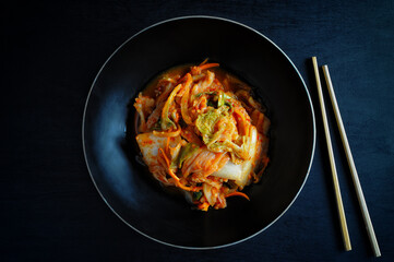 Kimchi, traditional Korean fermented cabbage in a bowl