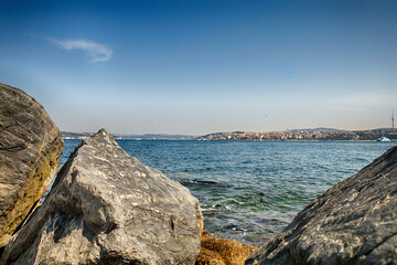 Sea shore. View of the Bosphorus and bridge. - 540629277