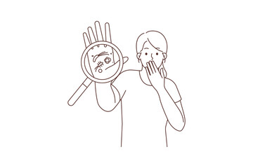 Stressed woman show bacteria under magnifier 