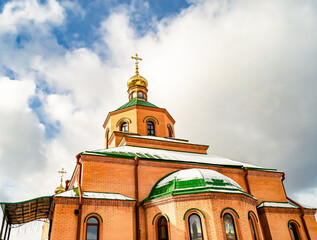 Christian church cross in high steeple tower for prayer
