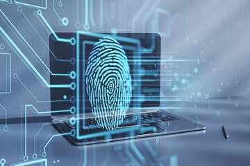 Close up of laptop with glowing fingerprint circuit hologram on blurry background. ID and database concept. Double exposure.