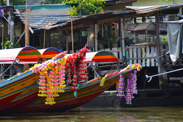 Fototapeta na wymiar Colourful tourist river boat in Bangkok Chao Phraya River, Thailand