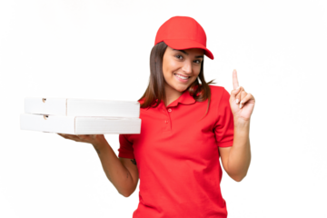 Pizza delivery caucasian woman with work uniform picking up pizza boxes isolated on green chroma background showing and lifting a finger in sign of the best
