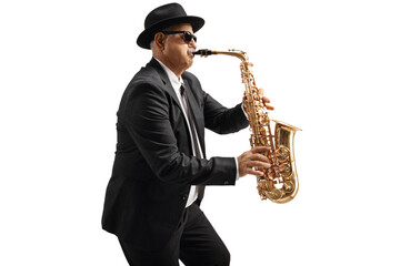 Mature male sax player with sunglasses performing