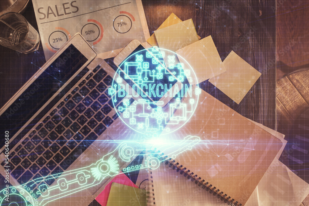 Poster blockchain theme hologram drawings over computer on the desktop background. top view. double exposur