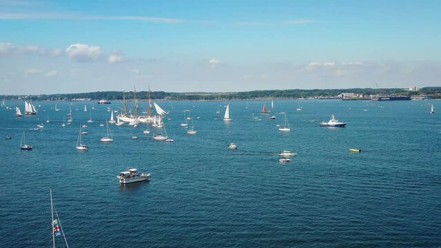 Tall ships passing Kieler F&ouml;rde to Kiel week. Parade of sailing ships during Kiel Week, Kiel Fjord, Schleswig-Holstein, Germany.

