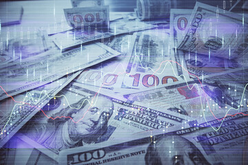 Fototapeta premium Multi exposure of forex chart drawing over us dollars bill background. Concept of financial success markets.
