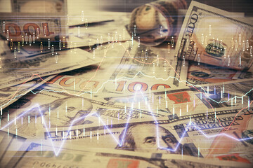 Multi exposure of forex chart drawing over us dollars bill background. Concept of financial success markets.