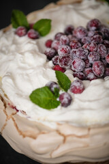 Detail of Christmas cake Pavlova with cranberries