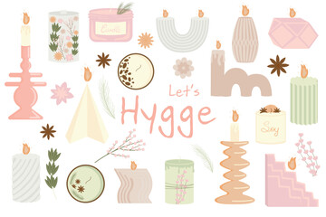 collection of handmade soy and coconut wax scented candles in candlesticks and jars of various shapes for home aromatherapy and cozy hygge template interior decor