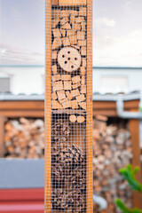 wooden insect hotel in the garden
