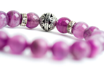 purple beads on white background