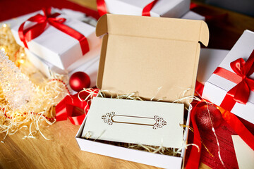 DIY Christmas present wrapping Christmas gift white box with a red ribbon