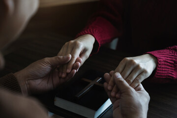 people  hands praying to god with the bible. Woman Pray for god blessing. Religious beliefs Christian life crisis prayer to god.