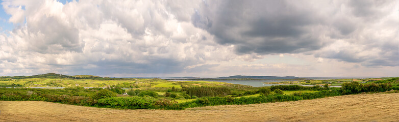 Panoramic view looking from Lowertown South toward Long Island side in summer on cloudy day