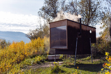 outdoor bivak sauna in autumn colors