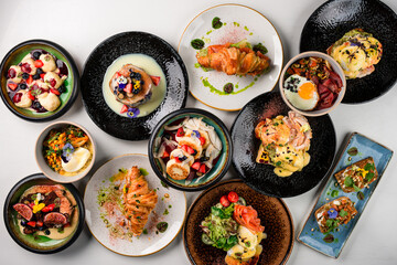 collection of breakfast dishes, a set table top view of a large set lunch