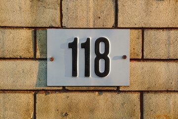 house number one hundred and eightteen (118)