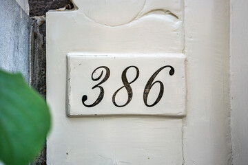  house number three hundred and  eighty six (386)