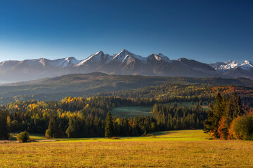 Beautiful sunset on the meadow under the Tatra Mountains at autumn. Poland