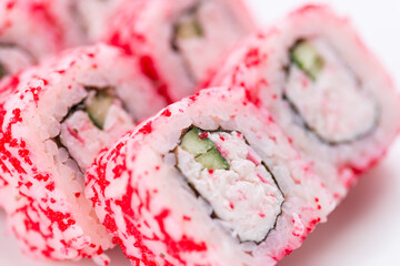 Sushi set and composition at white background. Japanese food restaurant, sushi maki gunkan roll plate or platter set.