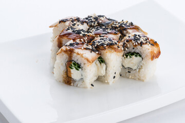 Sushi set and composition at white background. Japanese food restaurant, sushi maki gunkan roll plate or platter set.