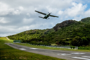 Fototapeta na wymiar Plane aircraft over the runway