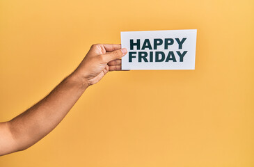 Hand of caucasian man holding paper with happy friday message over isolated white background