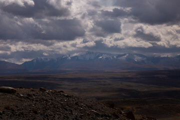 Distant Mountain Range And Rolling Landscape