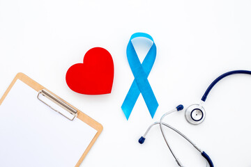 Awareness blue ribbon with red heart. Symbol of prostate cancer