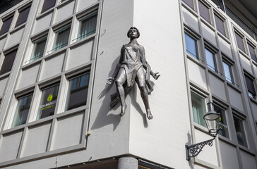 LUCERNE, SWITZERLAND, JUNE 21, 2022 - Modern sculpture on a building of Mulhen Square (Mulhenplatz)...