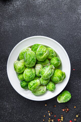 green Brussels sprouts raw vegetable food snack on the table copy space food background 