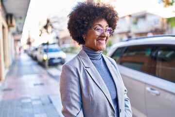 African american woman executive smiling confident standing at street