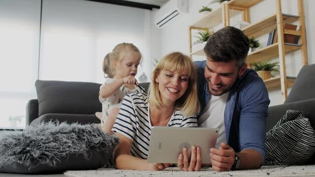 Family watching videos on tablet