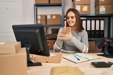 Young blonde woman ecommerce business worker having online deaf language conversation at office