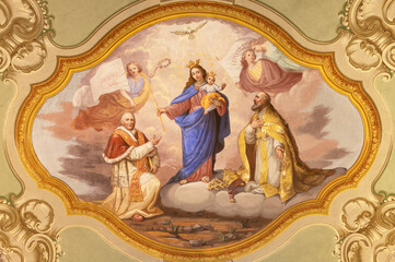 COURMAYEUR, ITALY - JULY 12, 2022: The ceiling fresco of Madonna among the saints in church in the...