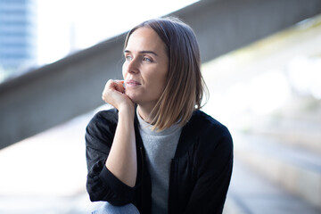 Fototapeta premium Close up melancholic woman looking away