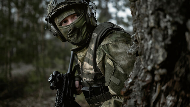 Soldier in camouflage Airsoft 